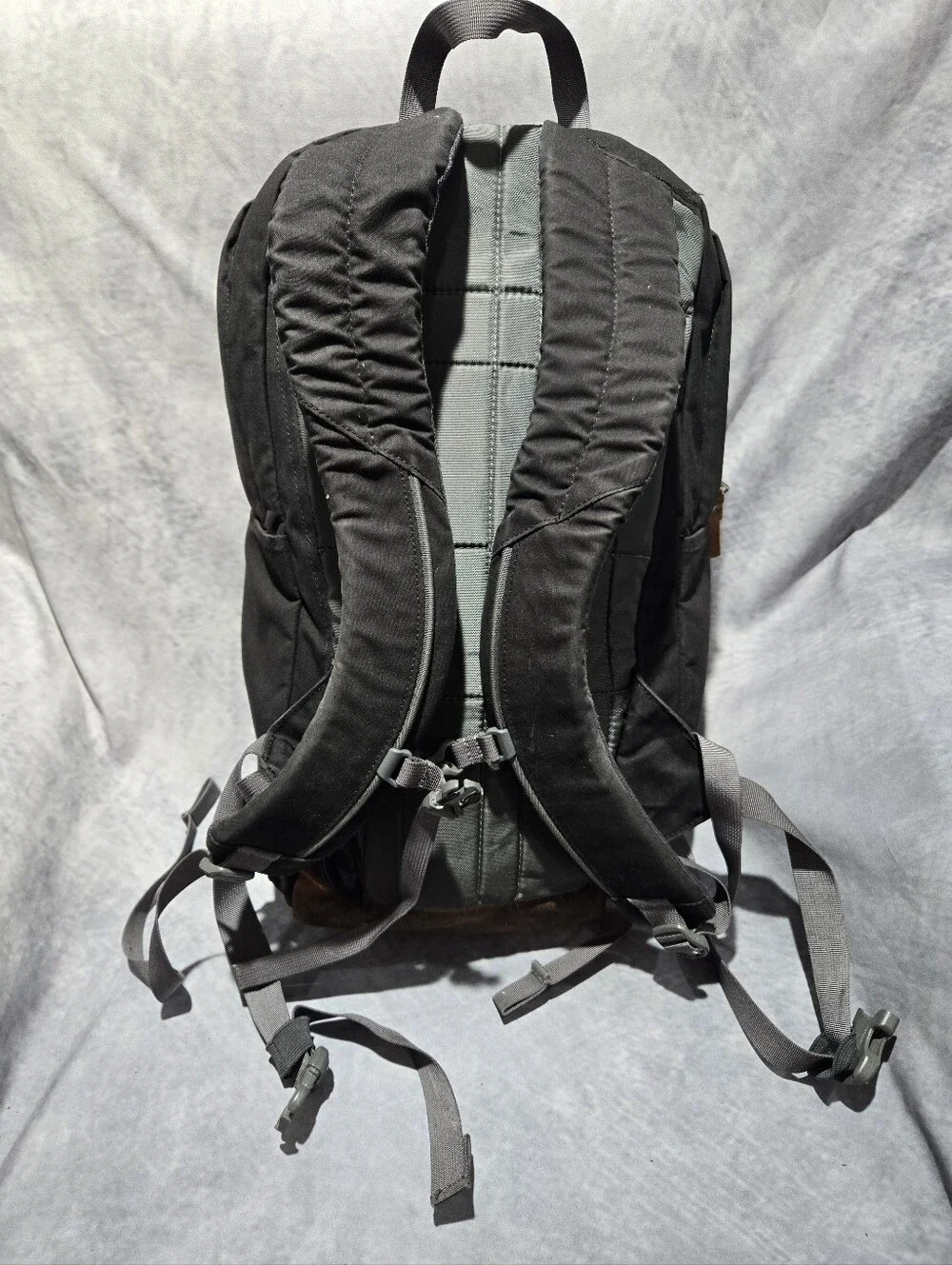 cotopaxi Black Backpack with Brown Leather Accents